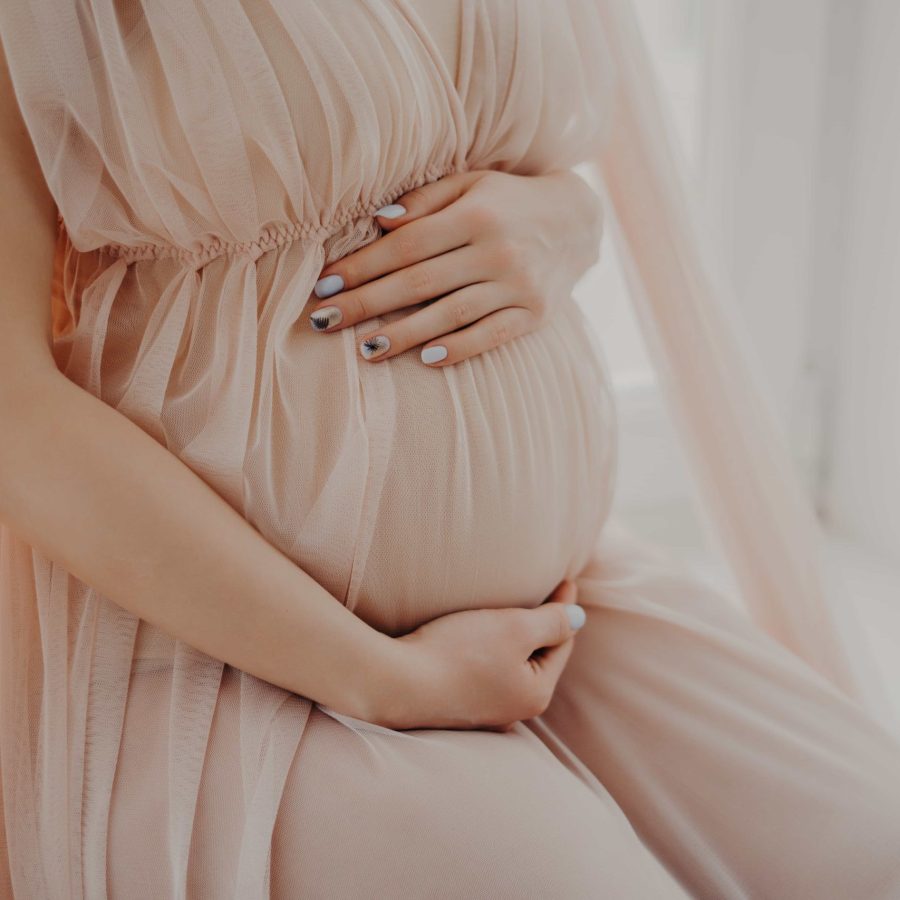 cropped-image-of-faceless-woman-touches-her-abdome-2023-11-27-05-25-59-utc-min